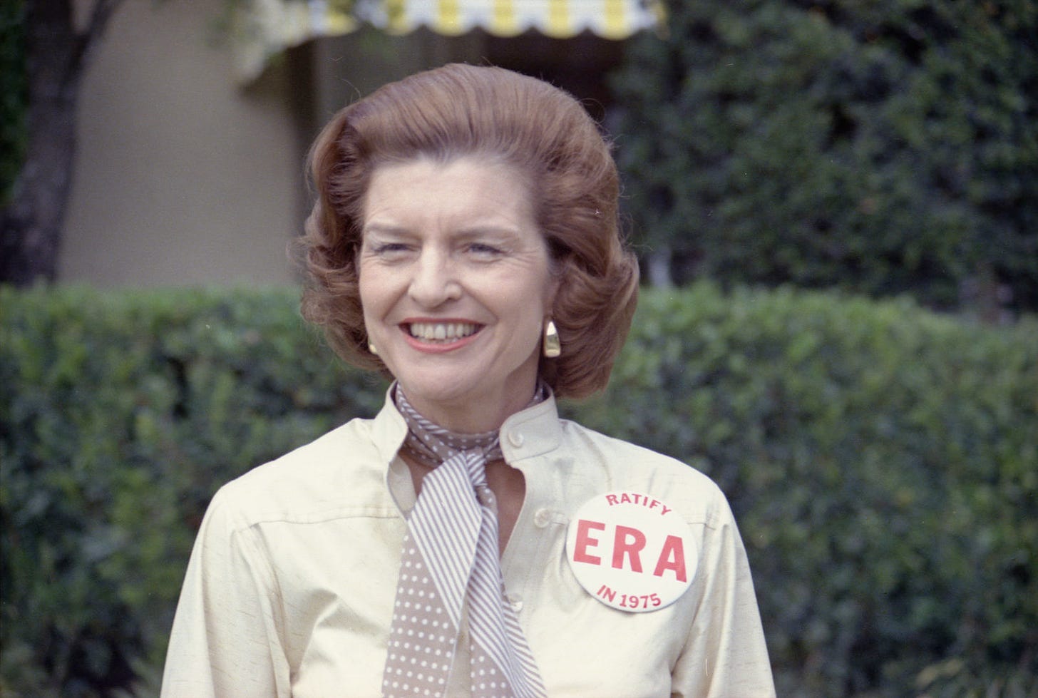First Lady Betty Ford sports a button expressing her support for ratification of the Equal Rights Amendment while taking some personal time as President Ford plays in the Jackie Gleason Inverrary Classic Celebrities Golf Tournament, Hollywood, Florida, in 1975. (Photo: Gerald R. Ford Presidential Library Museum)