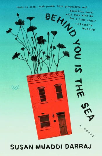 Behind you is the sea by Susan Muaddi Darraj on a turquote background with a red row house with flowers growing from the roof