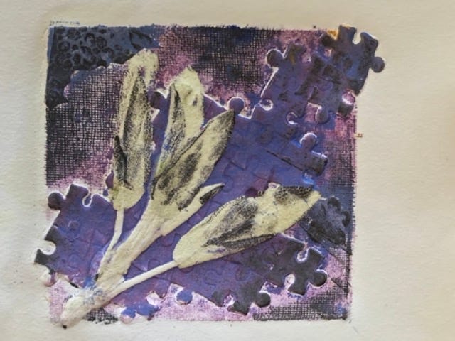 Purple collagraph by Kathy Garland with sage, ink, and puzzle pieces.