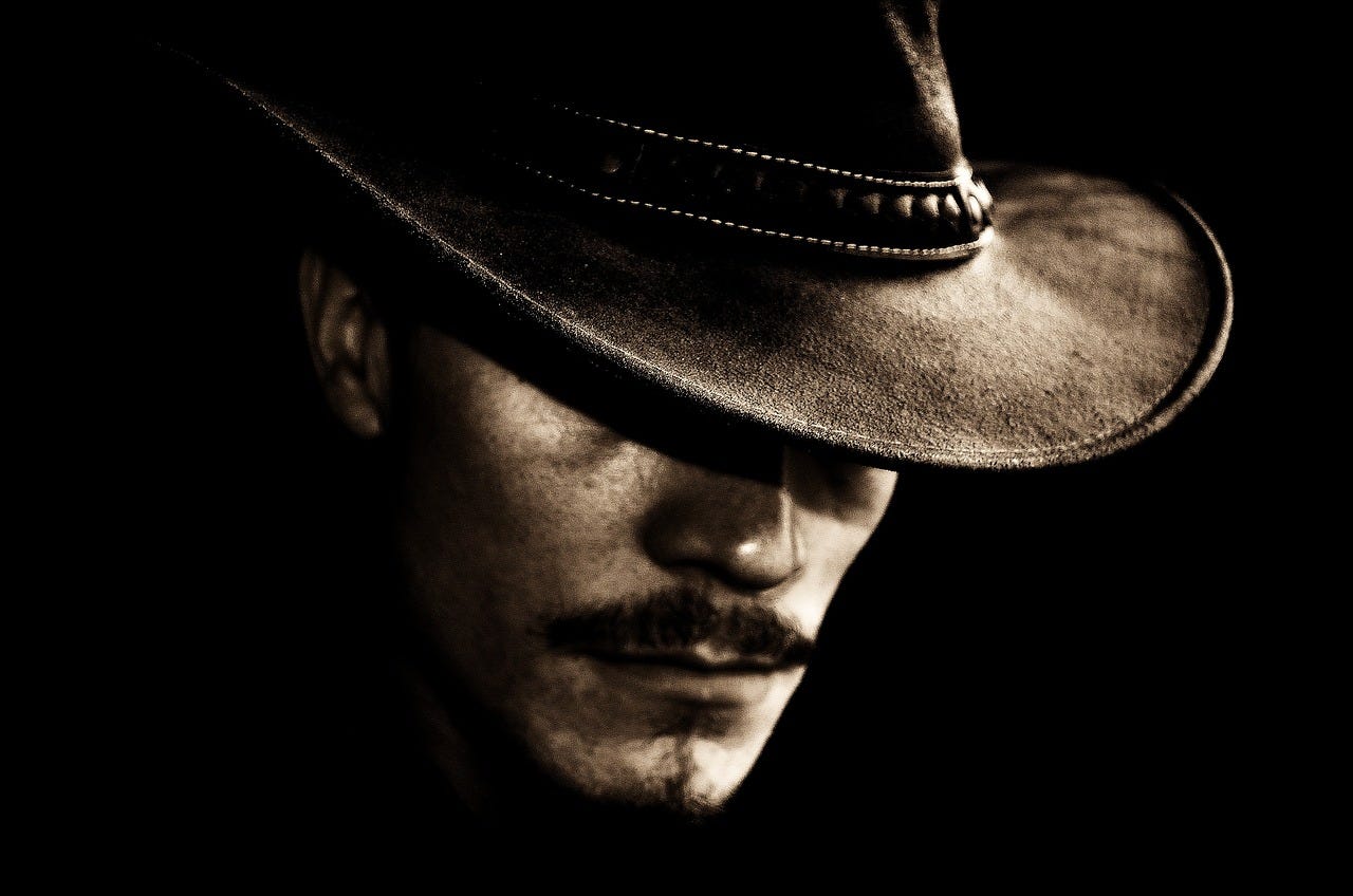 Cowboy wearing a black hat