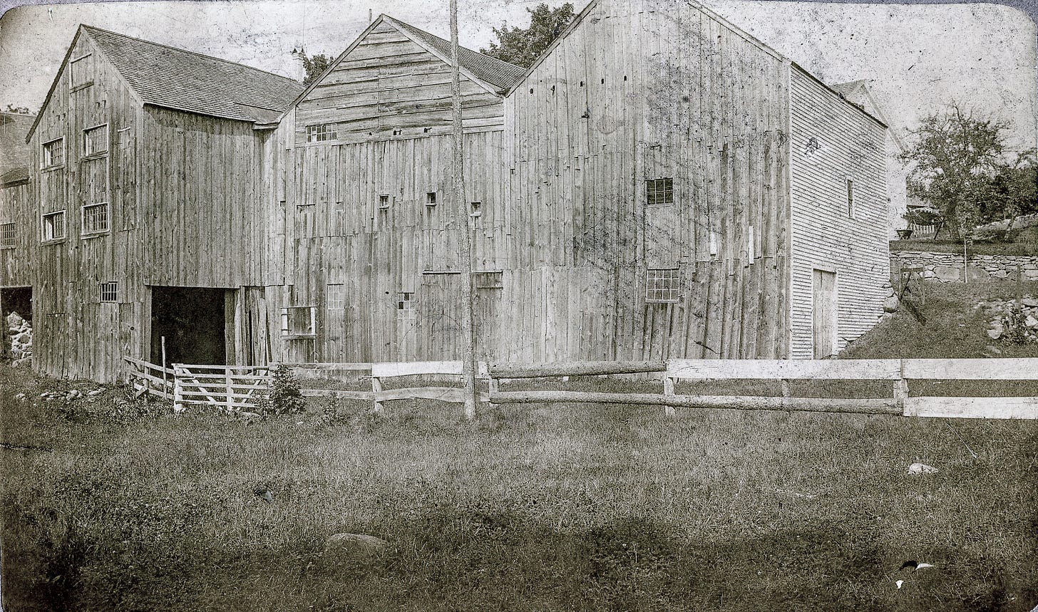 Three rustic barns