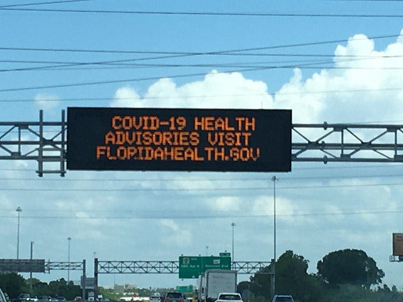 File:COVID-19 health advisories sign on Florida Highway.jpg