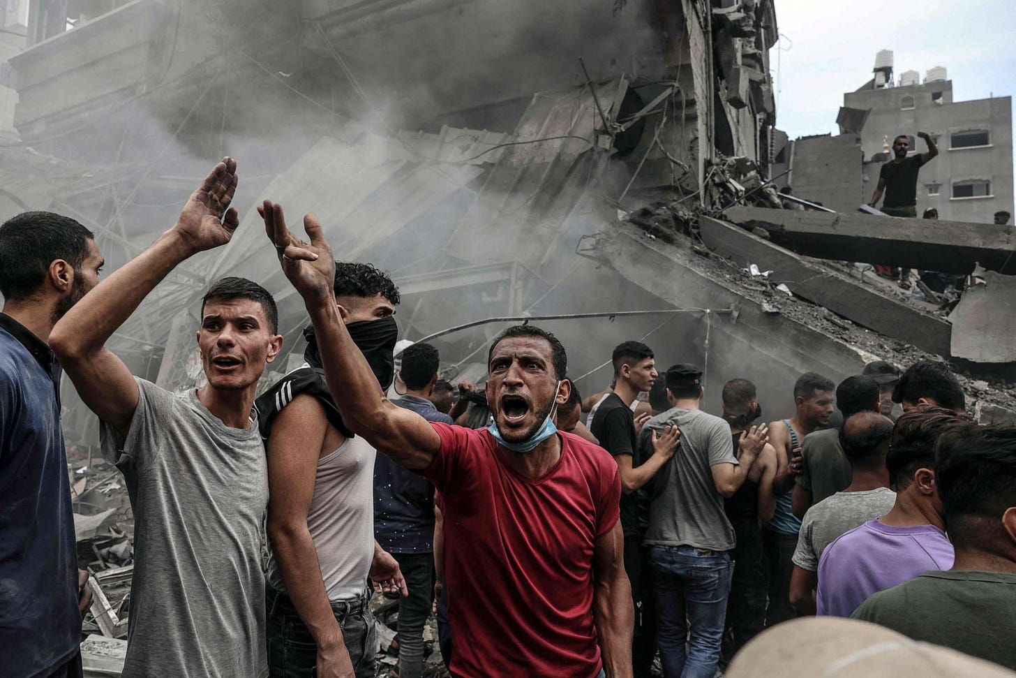 PHOTO: Palestinians search for survivors after an Israeli airstrike on buildings in the refugee camp of Jabalia in the Gaza Strip, Oct. 9, 2023.