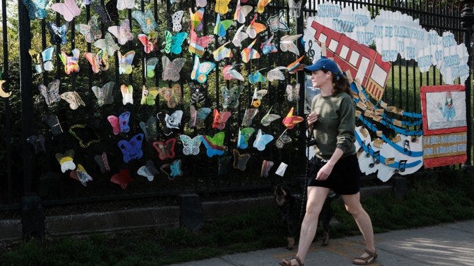 A memorial exhibit at Green-Wood Cemetery in Brooklyn commemorating the more than 1.1 million American’s who died during the pandemic.