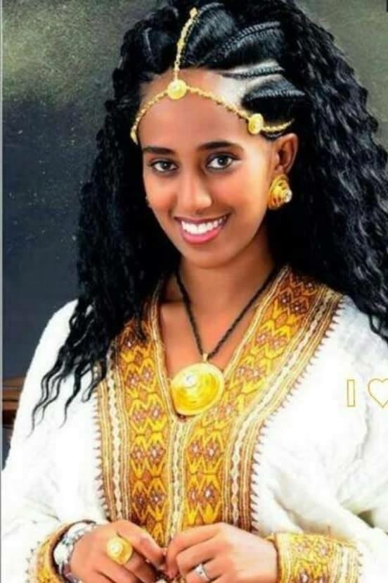 Young Eritrean woman from Tigrinya ethnic group in traditional wear  (Zuria), hair is breade "al-basso" style and she's wearing... –  @samuelernesto on Tumblr