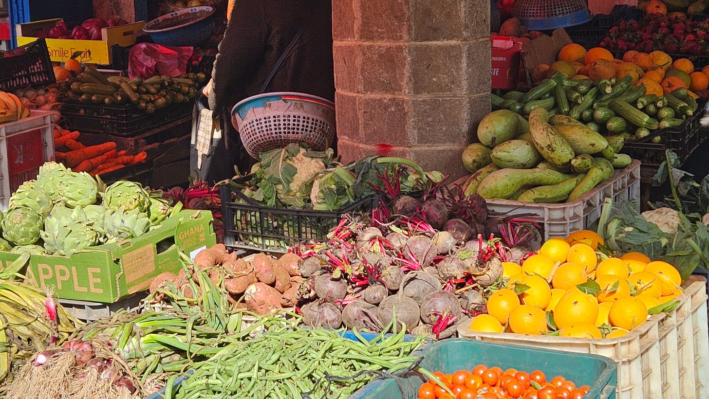 An array of vegetables and ruits in a farmer's market in Essaouira