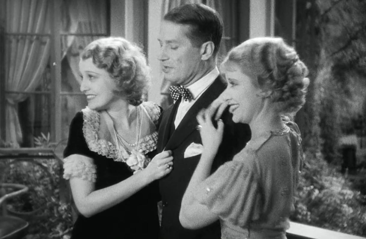 Jeanette MacDonald, Maurice Chevalier, and Genevieve Tobin in a scene from One Hour With You