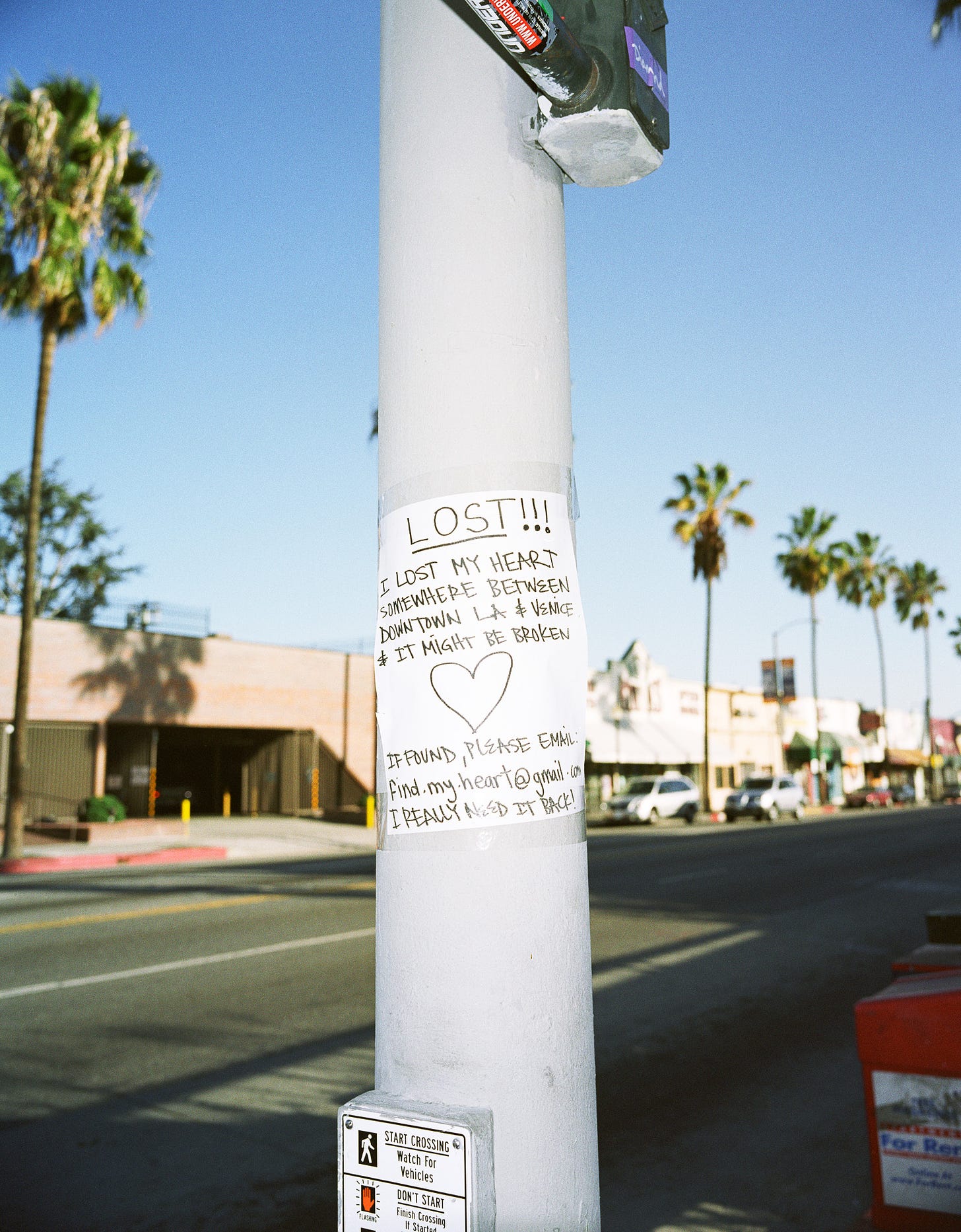 Sign tape to a pole, Fairfax District, Los Angeles