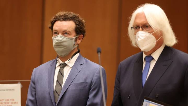 Danny Masterson stands with his lawyer Thomas Mesereau
