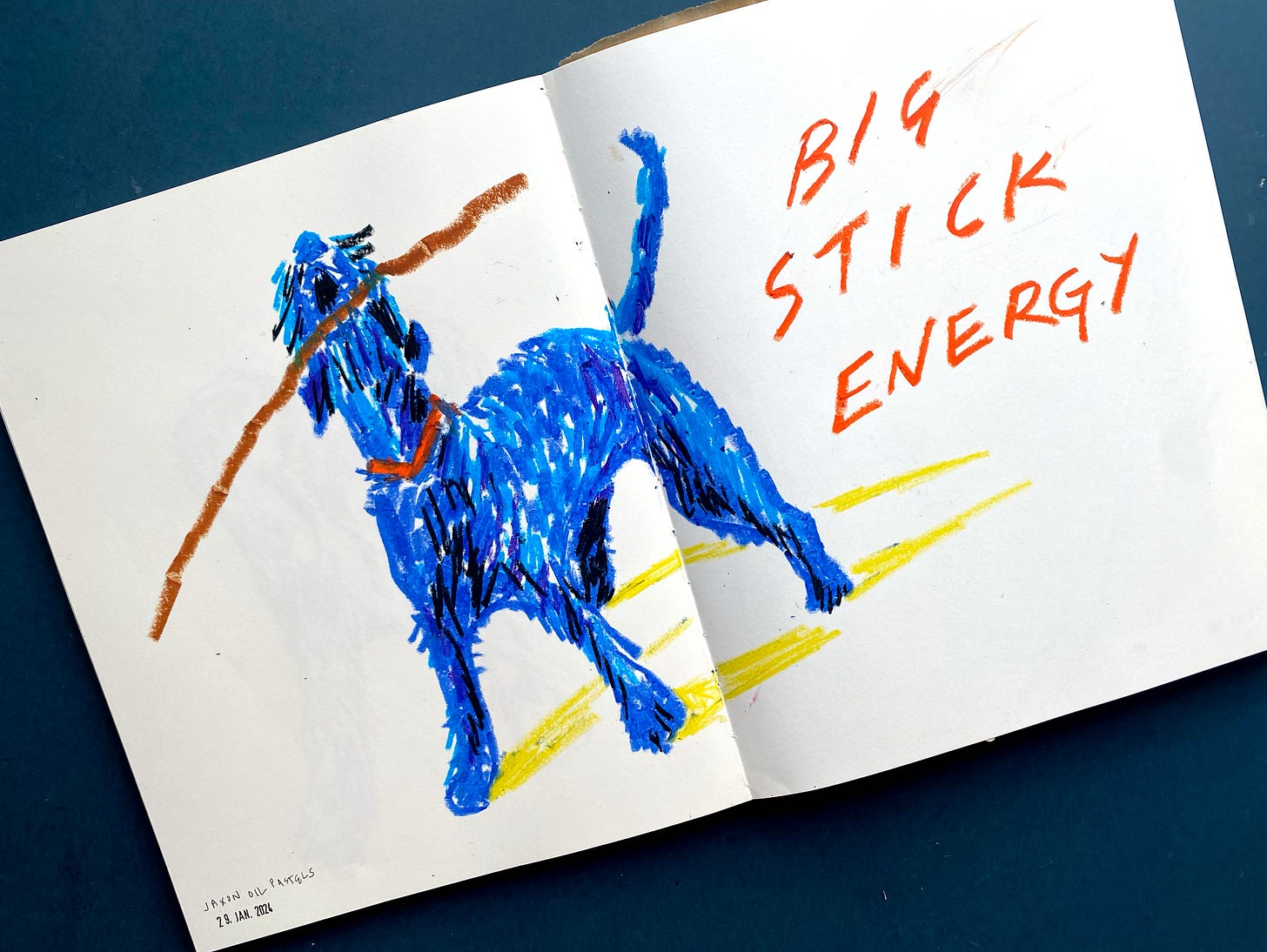 Sketch of a Giant Schnauzer dog, drawn with oil pastels in a loose style. The drawing is shown on an open sketchbook against a dark blue background.