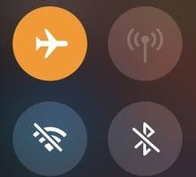 This may contain: four different icons on a black and orange background, including an air plane, wifi,