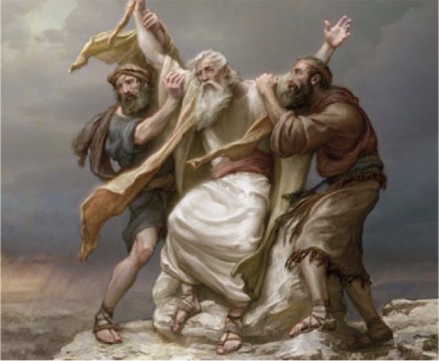 Moses' arms being held up by Aaron and Hur during the battle with the Amalekites.