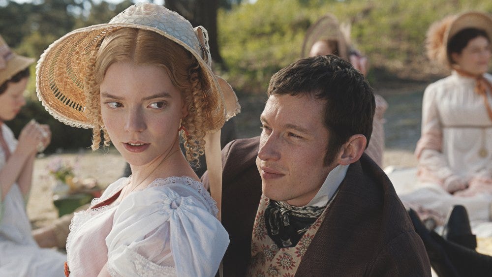 Emma and Frank talking privately at the picnic on Box Hill. 