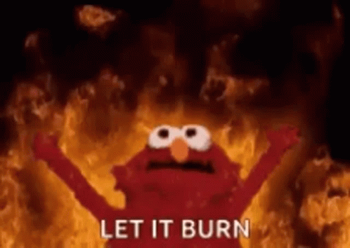 Elmo rages before an inferno crying, "Let it burn!"