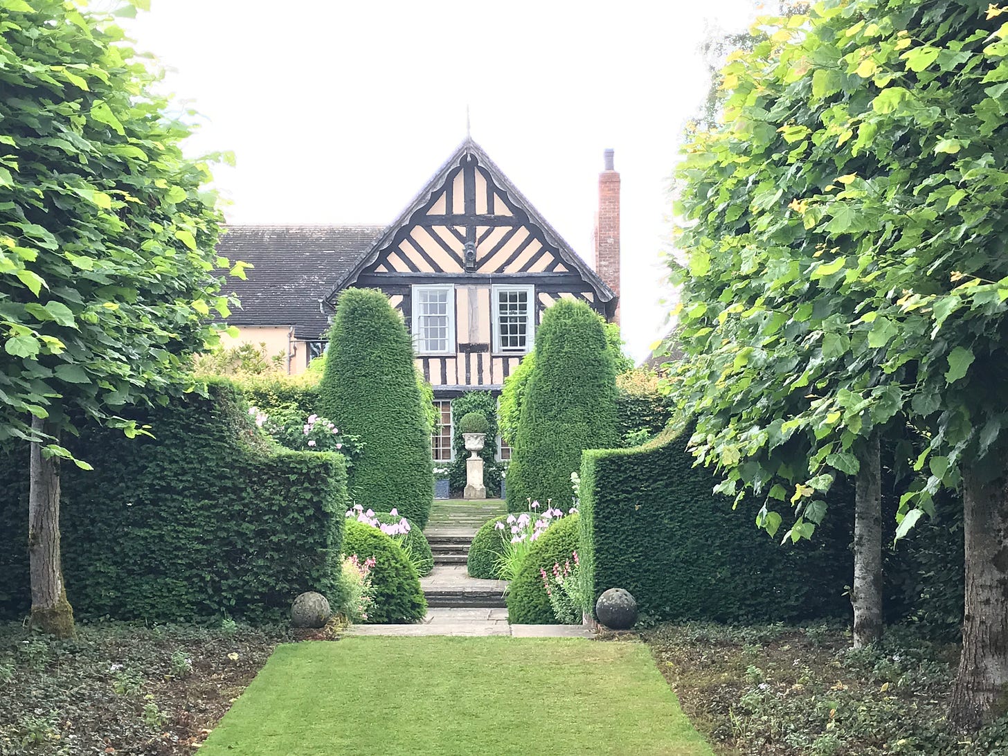 The green allee of limes is a calm space next to all of the flower gardens. 