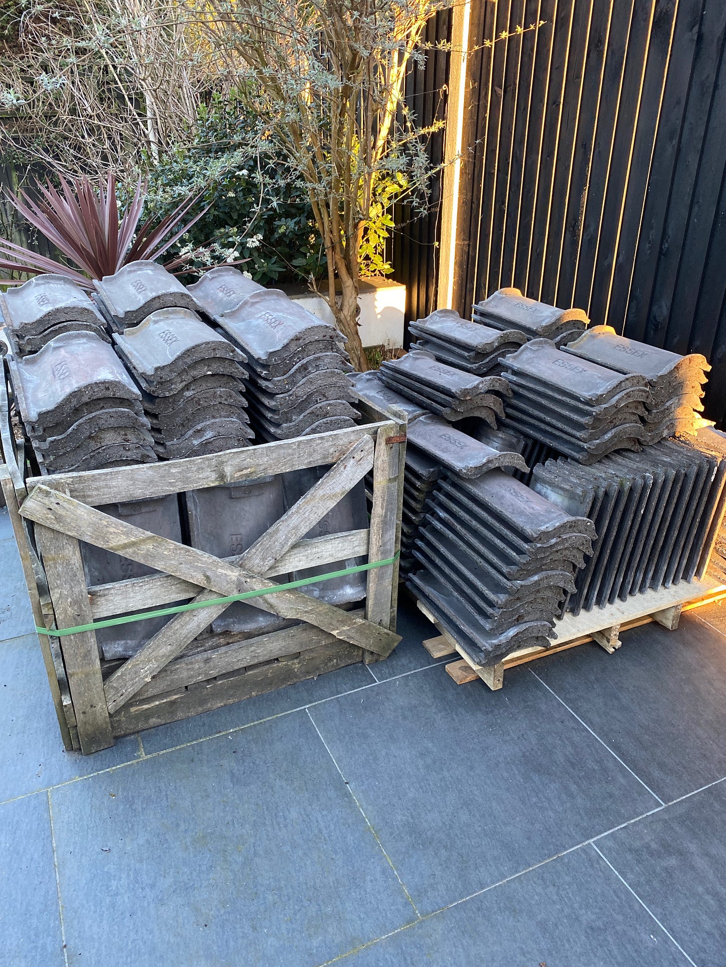 Pile of roof tiles in the garden