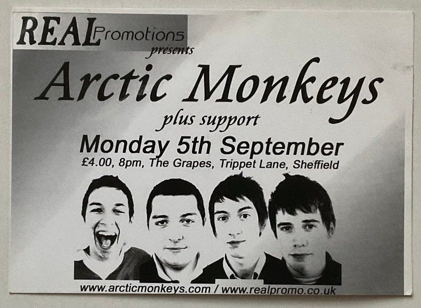 A ticket for Arctic Monkeys at The Grapes in Sheffield on Monday 5th September 2005 in black and white with the band's faces below
