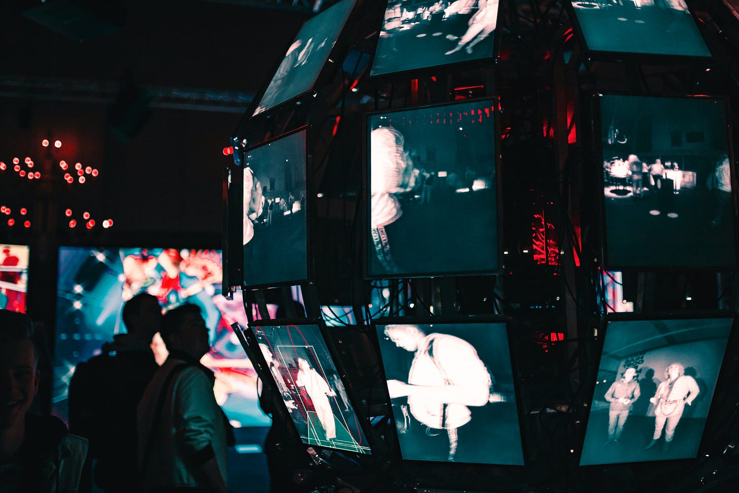 TV screens displaying people as part of an art installation
