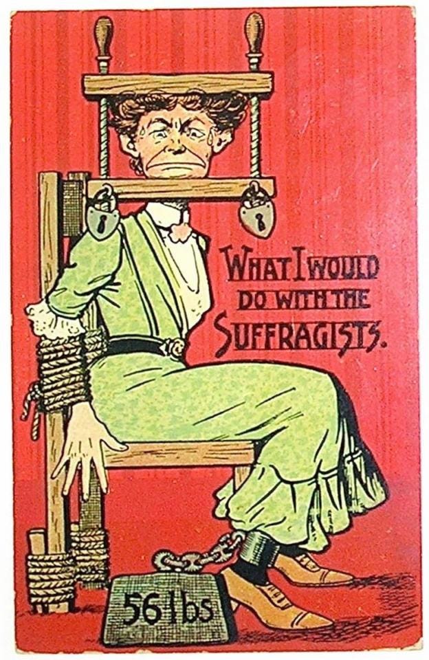  A suffragette is seen tied to a chair while her head in a brace in one shocking image