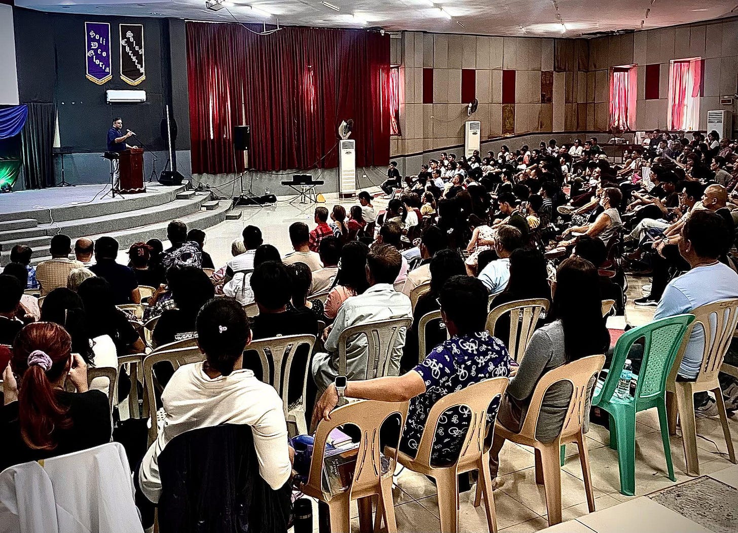 May be an image of 2 people and crowd