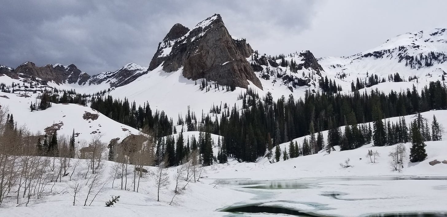 Sundial Peak over a frozen Lake Blanche in May 2019