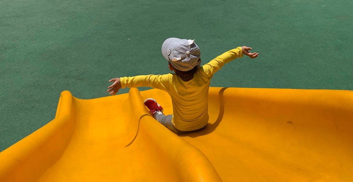 boy on a slide boy on a slide