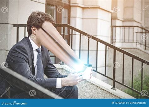 Man Sucked Into A Smartphone Stock Photo | CartoonDealer.com #107606814