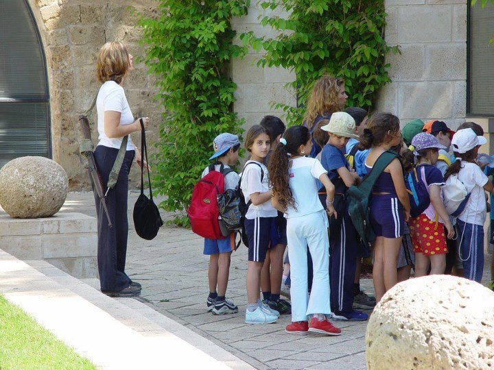 Israeli Teacher protecting  children