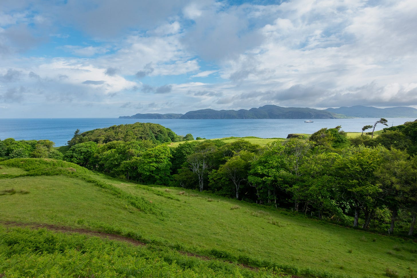 View over Glengorm Estate to the Ardnamuchan peninsula with the CalMac ferry heading to Coll and Tiree © Felicity Martin View over Glengorm Estate to the Ardnamuchan peninsula with the CalMac ferry heading to Coll and Tiree © Felicity Martin