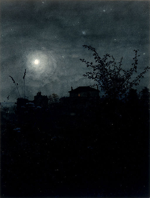silhouette of houses in moonlight