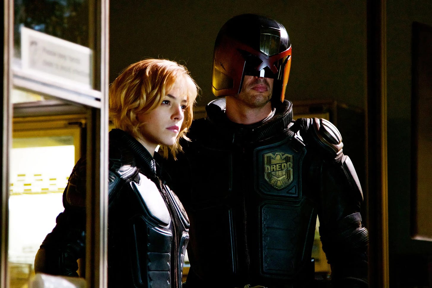 Still from the 2012 version of Dredd featuring Olivia Thirlby and Karl Urban