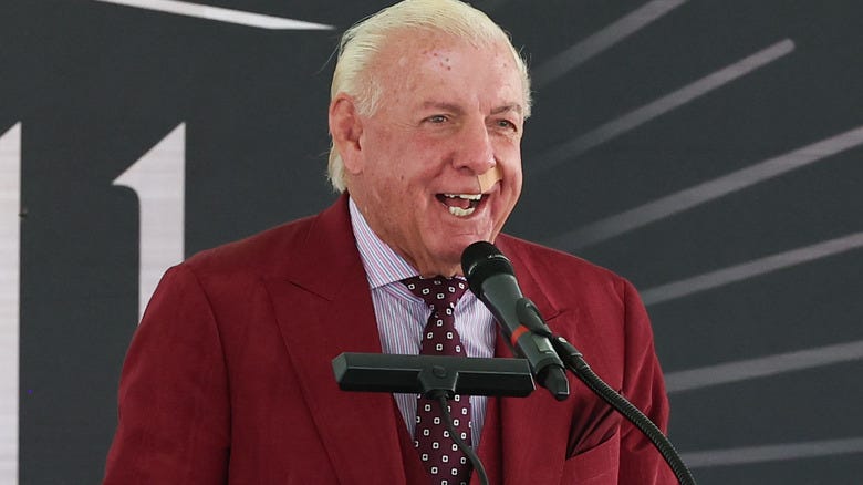Ric Flair speaking at a podium