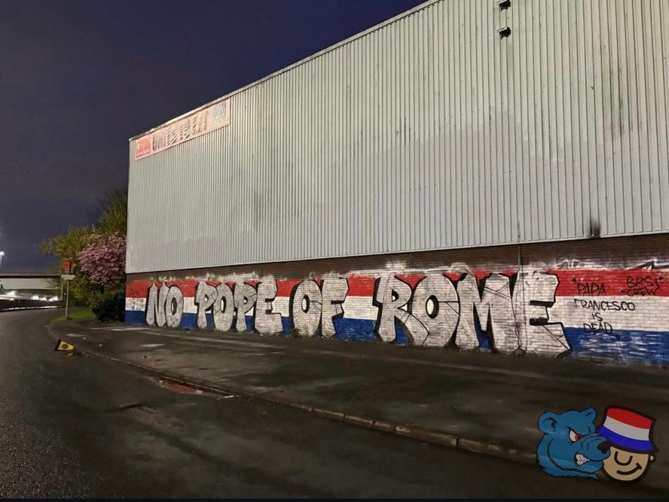 The Union Bears Graffiti on a building says "No Pope of Rome".