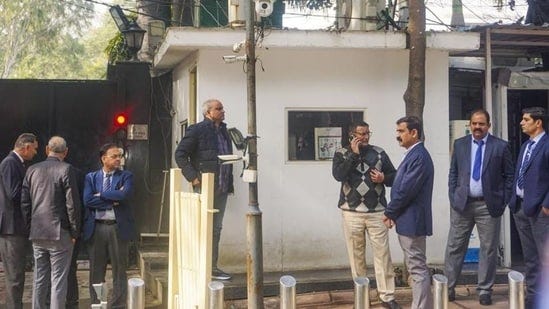 Delhi Police crime branch sleuths outside chief minister Arvind Kejriwal’s residence (PTI Photo)