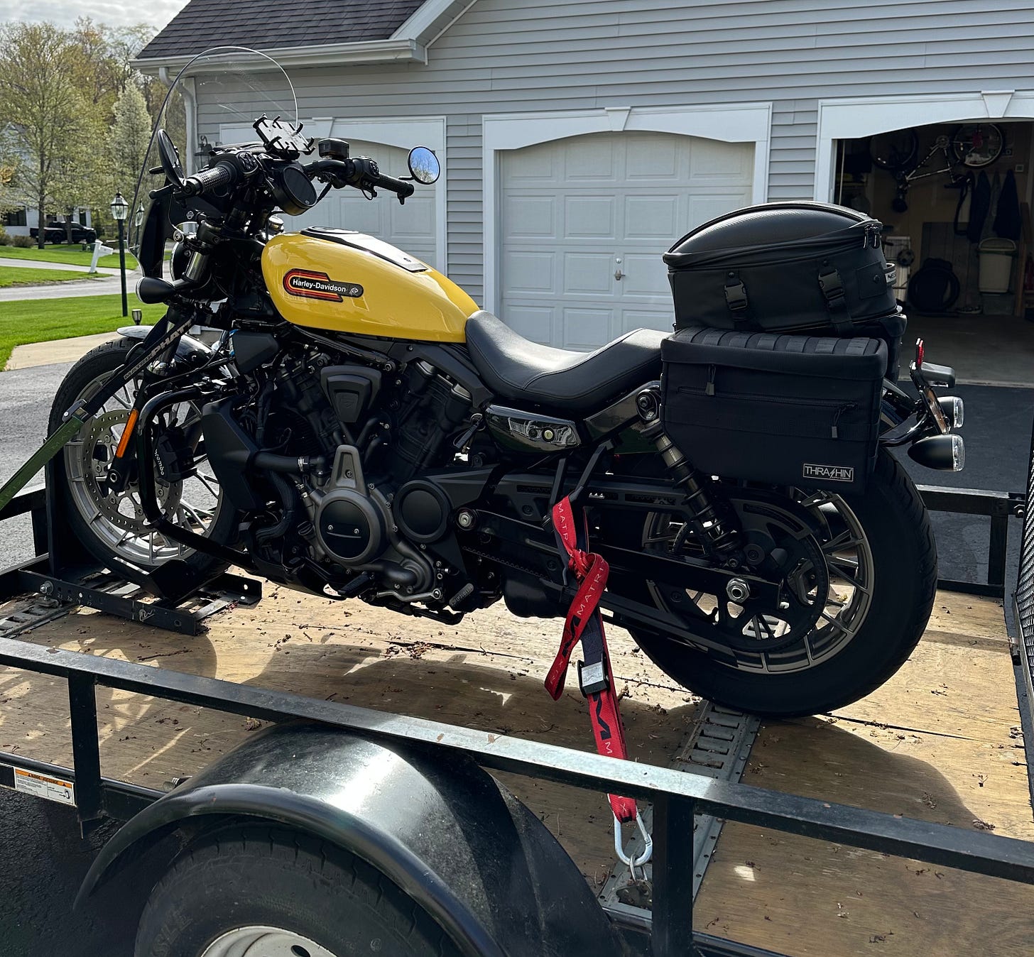yellow motorcycle on a trailer