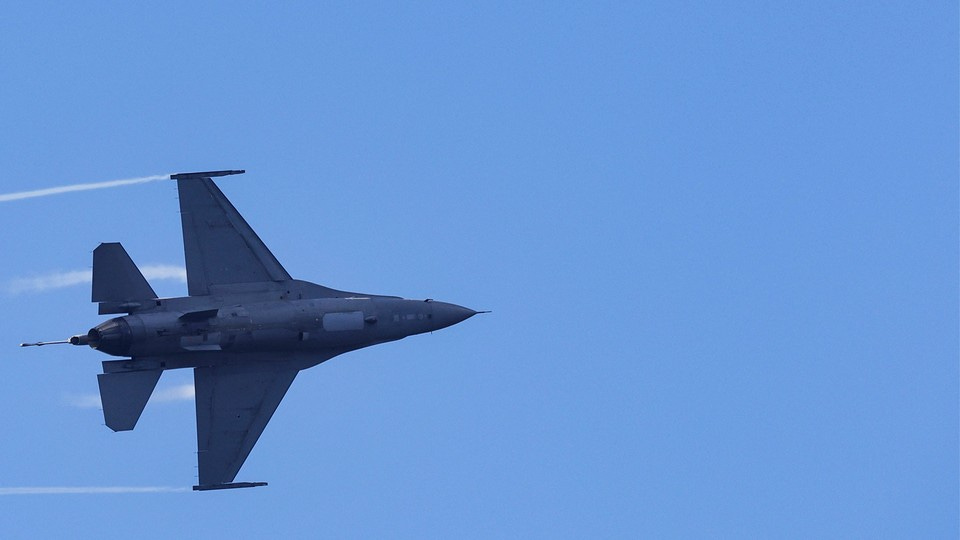 an F-16 sideways in midair