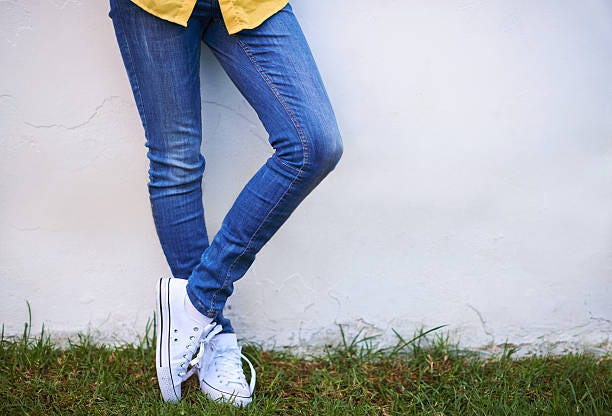 Casual style Cropped shot of a young woman standing outside skinny jeans stock pictures, royalty-free photos & images