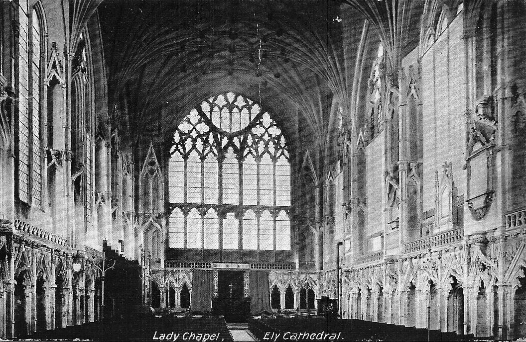 Black and white postcard of the Lady Chapel, Ely, showing its empty wall niches and the elaborate tracery and plain glass of its main window