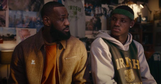 LeBron James is pictures speaking to his younger self.