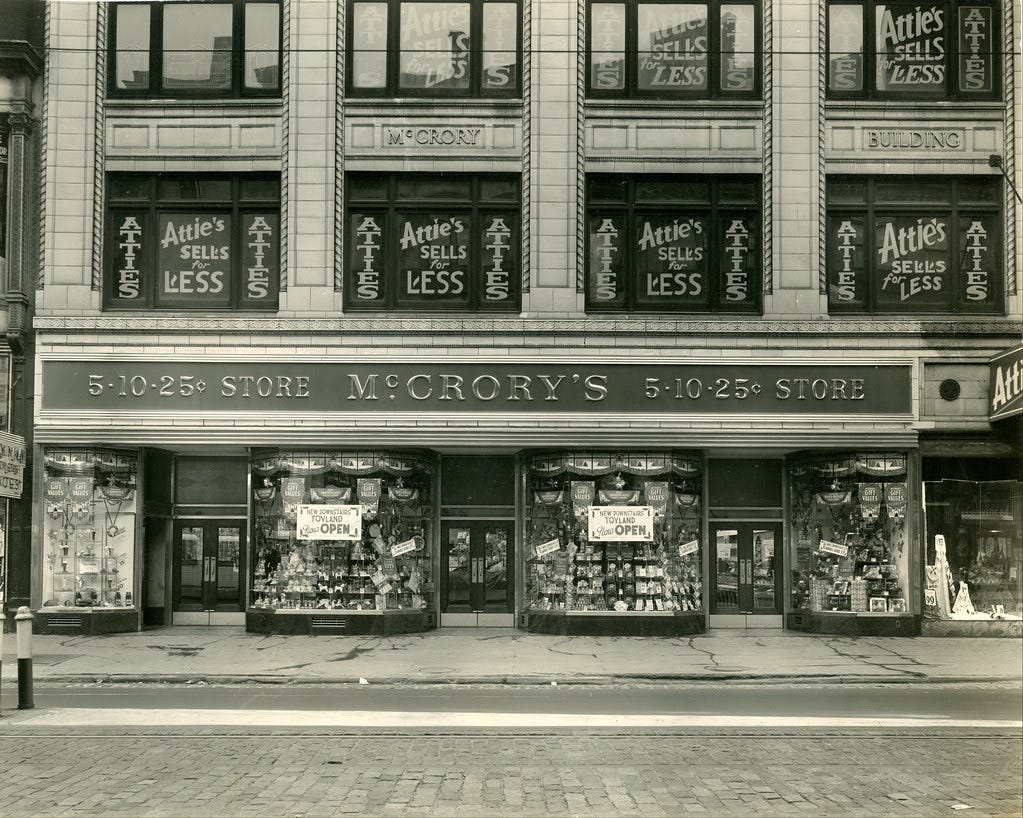 Photograph of a McCrory's store with the sign "5-10-25 cent store"