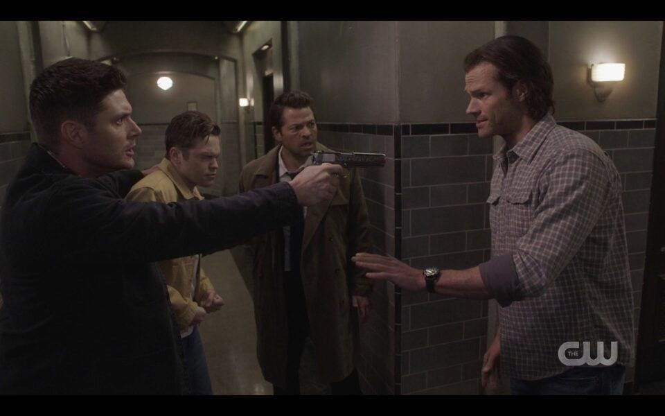 Sam Winchester calming Dean down with gun 1517