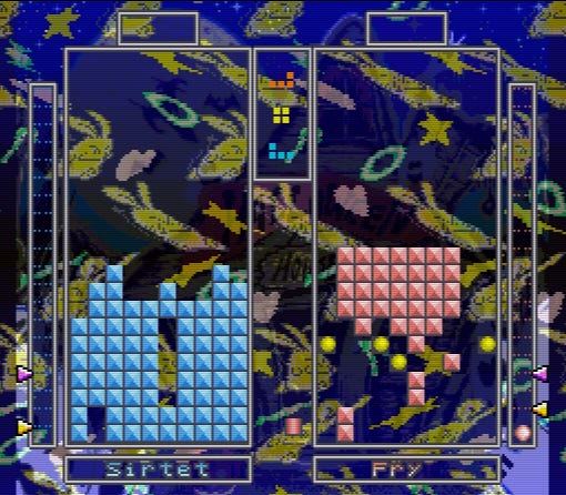 A screenshot of the end of Mirurun's "Sirtet" power, which changed the background to a real trippy screen of rabbits that look like they're melting, while the blocks on Halloween's side of the board were rearranged to be more of a pain to clear.