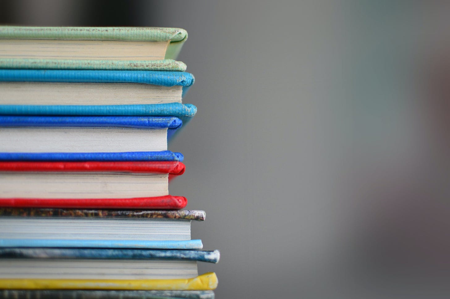 Close-up photo of edges of a stack of books.
