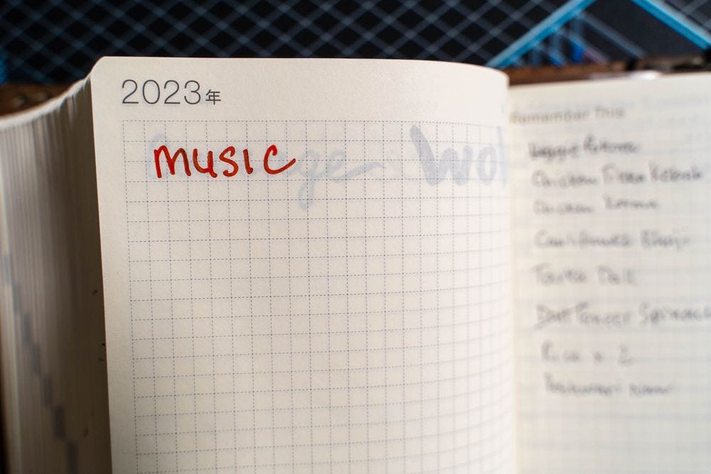 2023 diary page showing a hand-written entry simply reading "Music" in red fountain pen ink.