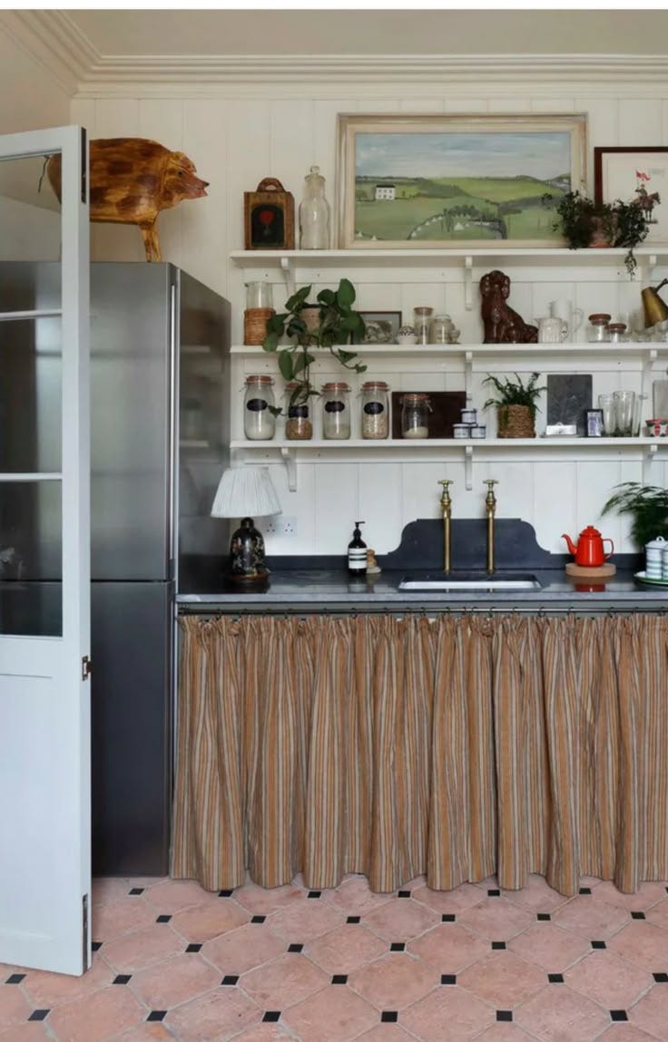 This may contain: the kitchen is clean and ready for us to use