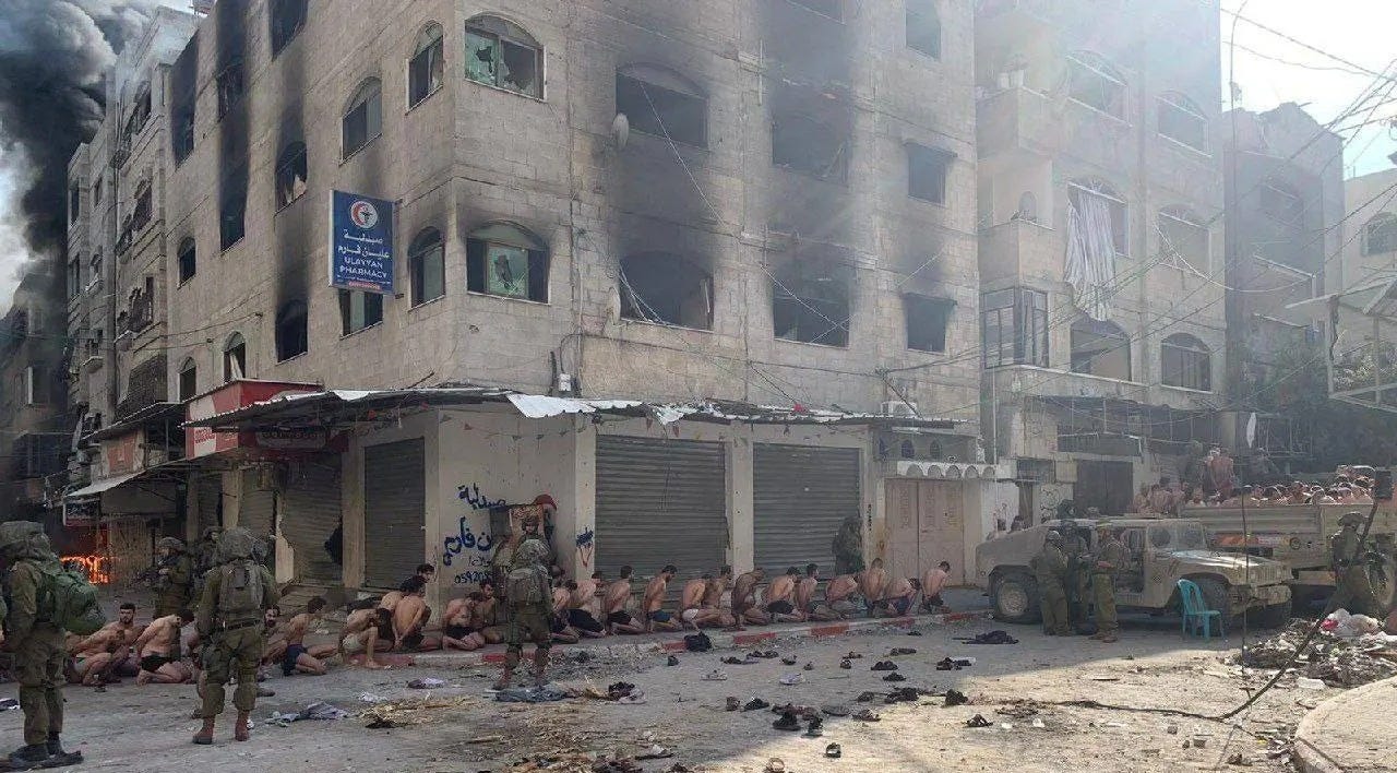 Over 100 men lined the streets of northern Gaza as they surrendered to the IDF who stripped, blindfolded and restrained them to check if they had any Hamas links
