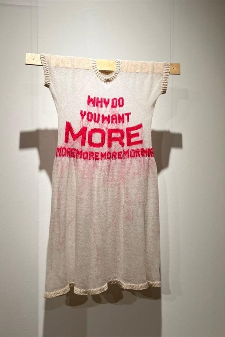 This may contain: a t - shirt that says, why do you want more?