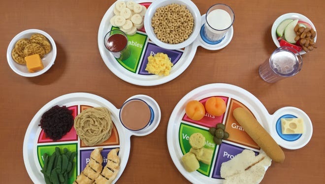 The USDA's My Plate dietary guidelines call for balanced meals with a plate half filled with fruits and vegetables, leaving room for a serving of grains and protein, plus low-fat dairy.