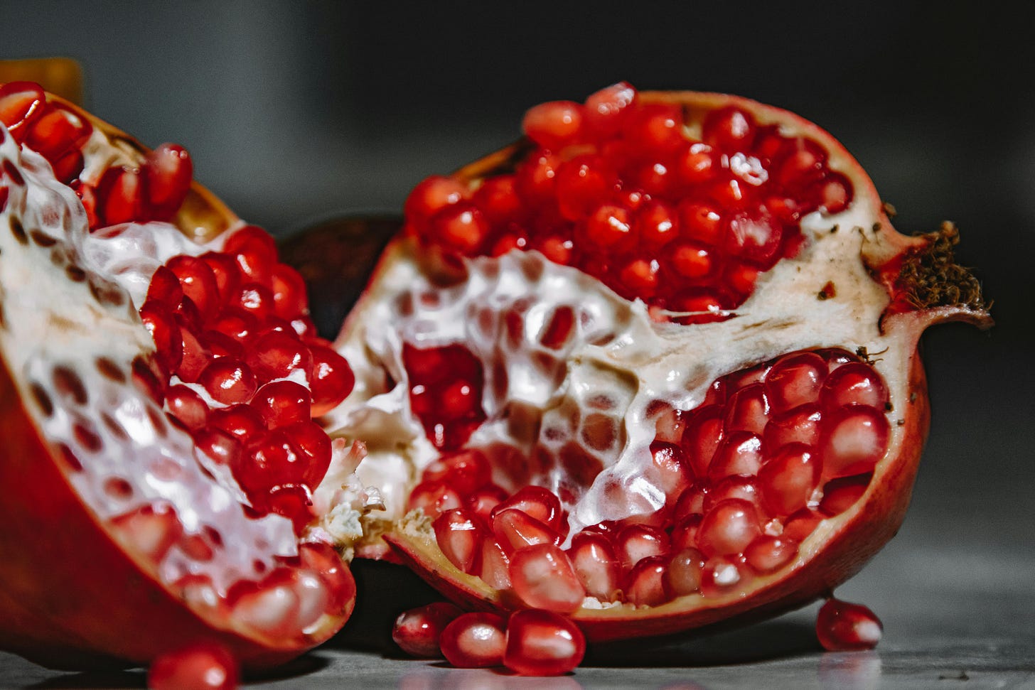 image of a sliced open pomegranate