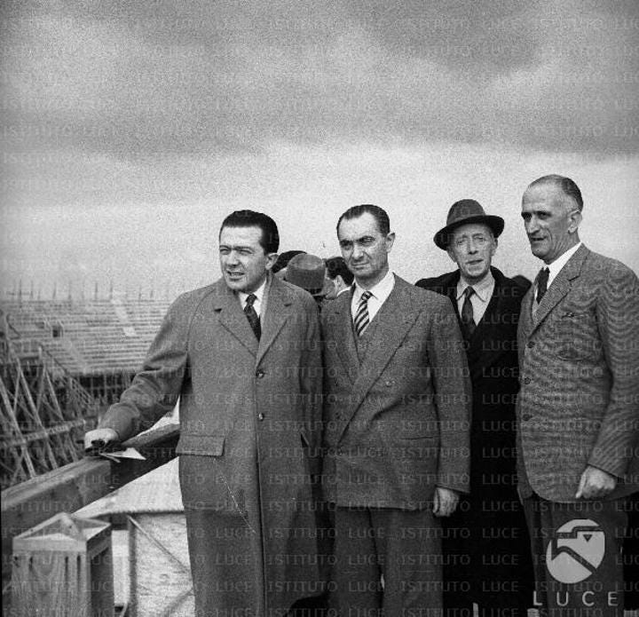 Andreotti, Cotellessa, and an elderly politician, accompanied by Luzzatto, admire the set under construction of the film Quo Vadis? in Cinecitta in 1950